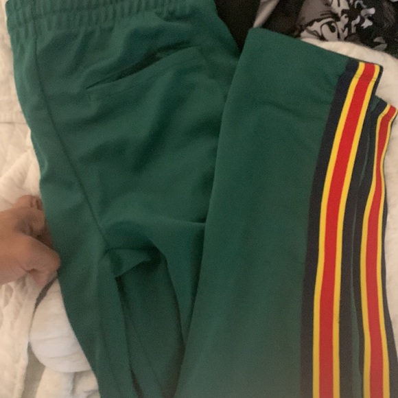 Selling track pants color green yellow and red and very dark blue. Medium size - Picture 2 of 2